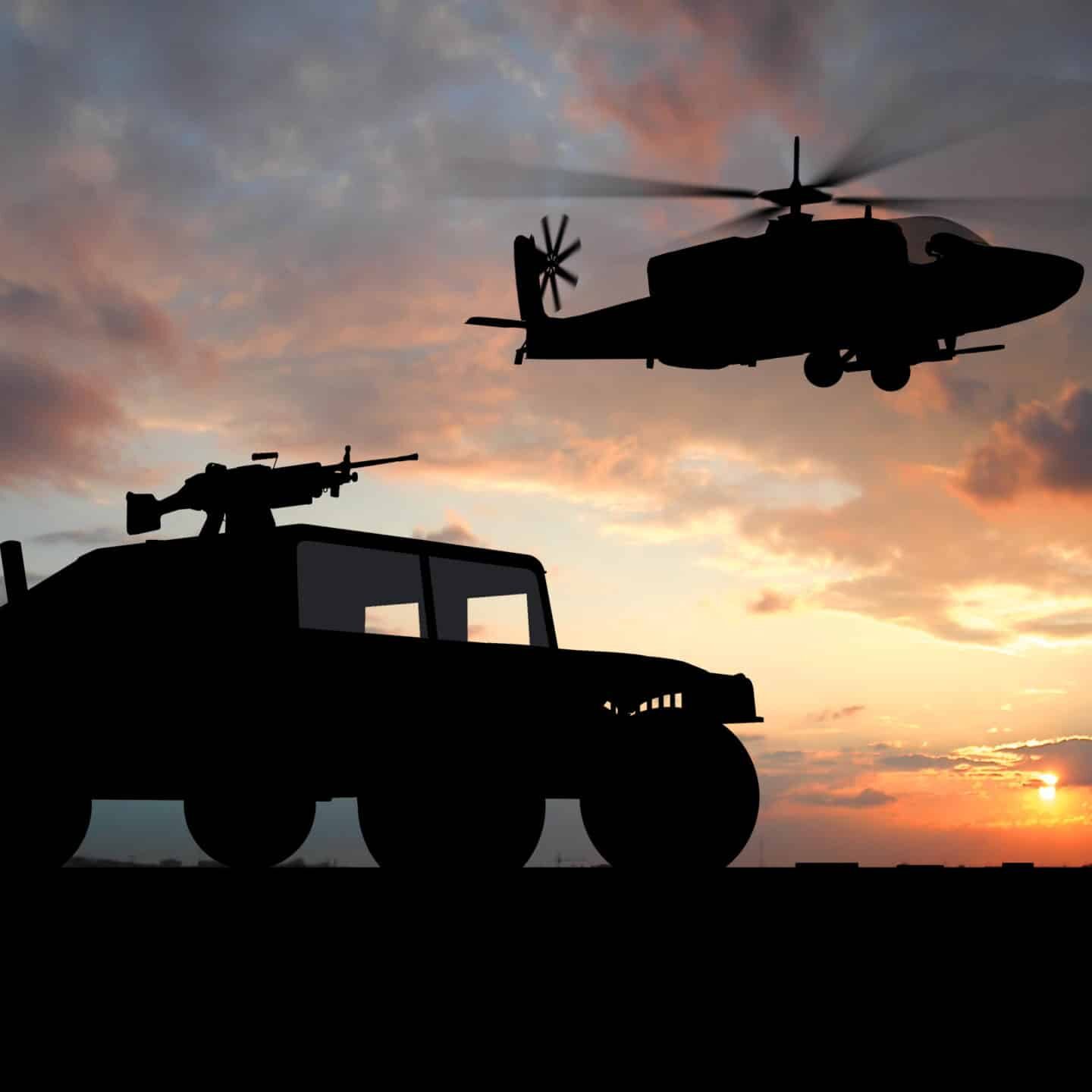 Silhouette of truck over sunset with helicopter. iten ballistics